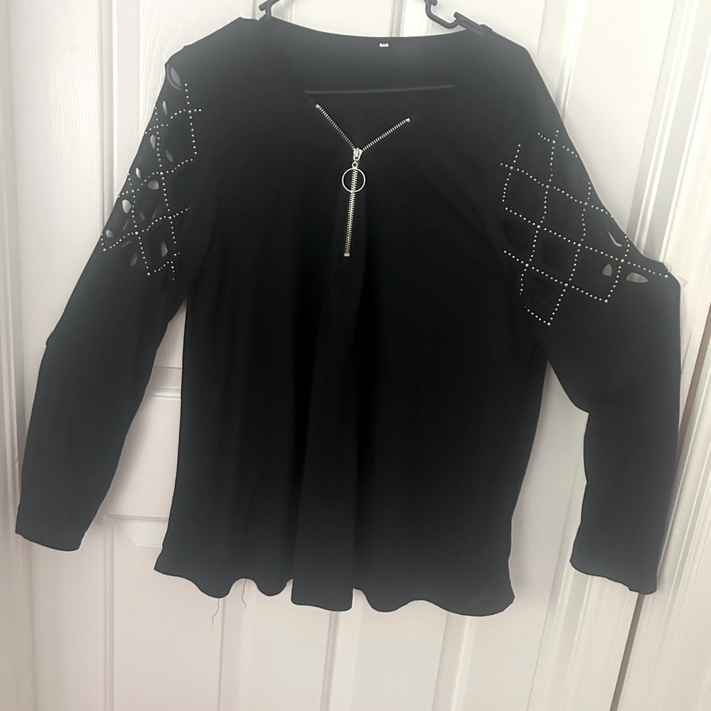 Black Zipper Detail Women's Top with Stylish open work sparkling sleeves.